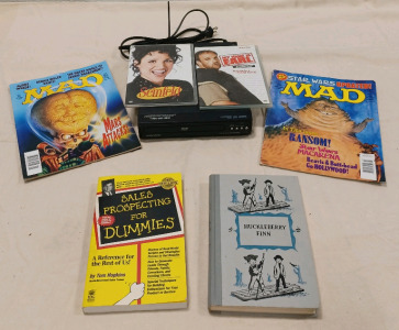 (1) DVD Player (2) DVD (2) MAD Magazines