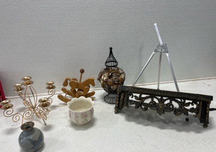 (1) Vintage Handcrafted Pottery (1) Small Bud Vase (1) Hand Painted Bird (1) Lenox White &Pink Roses (1) Brass Candle Holder (1) Wood Rocking Horse (1) End Table Basket