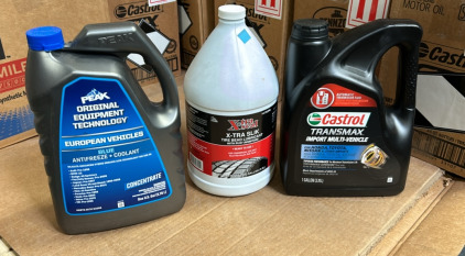 (1) Gallon European Blue Antifreeze, (1) Castrol Transmax Import, (1) Xtra Slik Tire Lube