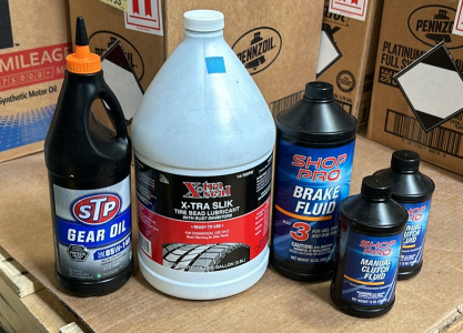 (1) 1 Gallon Xtra Slik Ture Bead Lube, (2) 12oz Manual Clutch Fluid, (1) 1 Qt 85W-140 Gear Oil, (1) 32oz DOT 3 Brake Fluid And More
