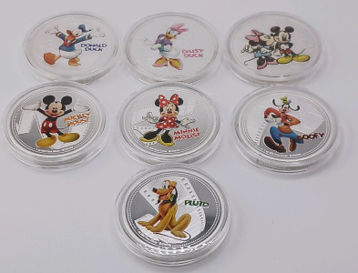 (7) Silver Plated Disney Characters Collectible Coins