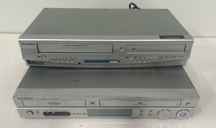 (1) Samsung DVD-VR320 DVD Recorder (1) Sylvania DVD Player VCR DVC840G