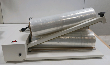 (4) Rolls of Shrink Sealing Wrap (1) Sealing Machine (Powers on)