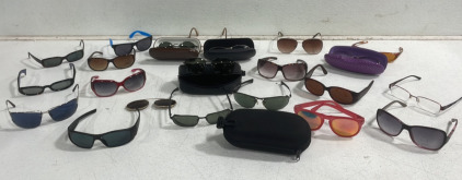 (1) Pair of RayBands Sunglasses (1) Pair of Givenchy Sun Glasses (20+) Assorted Sun Glasses