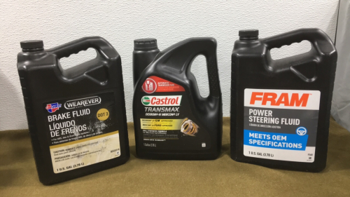 (1) Gallon Car Quest DOT 3 Brake Fluid, (1) Gallon Castrol DextronVI/MertonLV Automatic Transmission Fluid & (1) Gallon Fram Power Steering Fluid