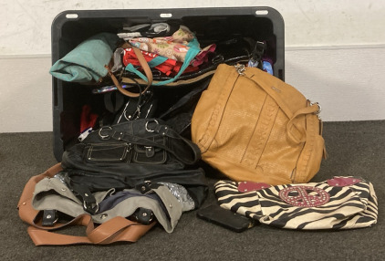 Tote Full Of Purses and Bags