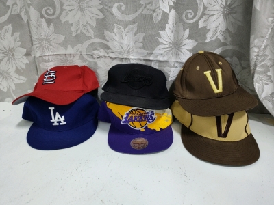 Assorted Sports Caps including Lakers,St. Louis, &Falcons
