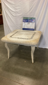 Wicker & steal table W/18in. Medallion