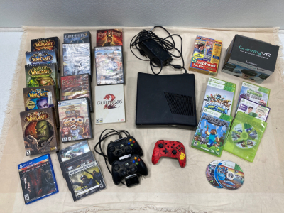 (1) XBox 360 (3) Controllers (25) Games & More!