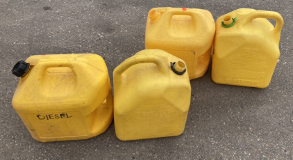 (4) Yellow Five Gallon Diesel Tanks