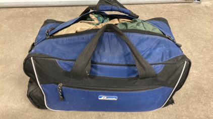 Green/Tan Sleeping Bag in Blue Duffel