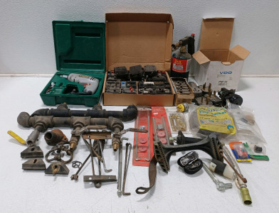 (2) Plumbing Pipes (1) Skill 924 Speed Drive-R-Drill Powers On(1) Box Of Assorted Circuit Breakers (1) Propane Tank w/Tip (4) Angle Plugs (1) Weather Strip (2) Battery Hold Down & More