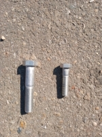 Assorted hardware bolts range from 3. 1/2"to2.1/2" blue bin with2.1/2" and blue crate with 3.1/2" - 2