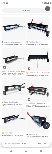 Brinly hardy 40"pull behind spike aerator for lawn tractors.10"blades white black rubber wheels