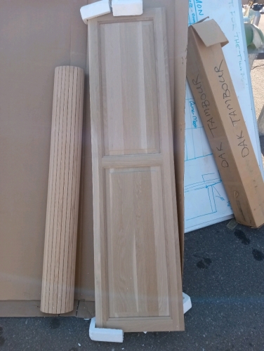 Wood pantry doors with oak trim border