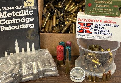Small Box Of Brass In Various Calibers w/ Some reloading Precussion Caps, VHS Guide For Reloading & Some Live Ammo For 32 Auto & Other Loose Rounds