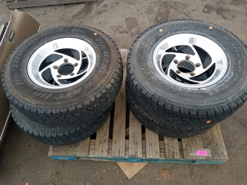 (4) thunderer ranger a/t r404.30x9.5r15lt good condition with rims