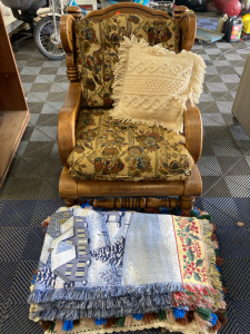 Vintage Chair with Blankets and Throw Pillow