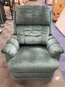 Recliner- New Cond. green in color