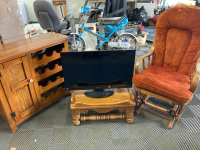 Wine Cabinet, Flat Screen TV, Rocking Chair, End Table