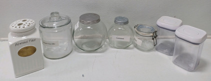 (4) Assorted Glass Jar Canisters (2) Plastic Canisters & (1) Flour Canister
