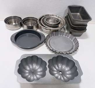 (11) Loaf Pans (2) 4pcs Mixing Bowls (6) Assorted Mixing Bowls (1) Pumpkin Pan (3) Desert Pans (1) Round Cake Pan