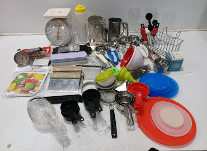 (1) Kitchen Scale (5) Sets Of Measuring Cups (7) Assorted Ice Cream Scoopers (2) Flour Sifters (4) Assorted Cheese Graters (2) Oven Mitts (1) Sponge Holder & More!