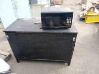 Work bench black fair condition 48"1/2 long 24"wide emerson microwave black 19"long 13"1/2 Wide good working order - 2