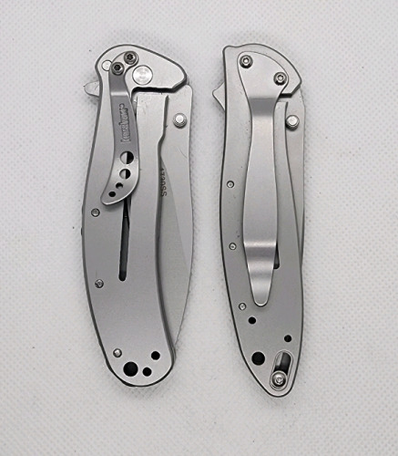 (1) Kershaw Speedsafe Pocket Knife, (1) Silver Unbranded Pocket Knife