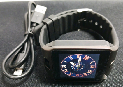 Smart Watch & Charger (Powers on)