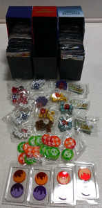 (3) Pok&eacute;mon Card Boxes (2) Boxes of Empty Pok&eacute;mon Trading Card Wrappers (13) Dice (12) Chips (3) Magnets