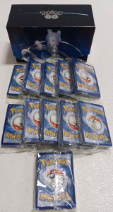 (11) Unwrapped Pok&eacute;mon Card Sets (1) Pok&eacute;mon Go Card Collection Box