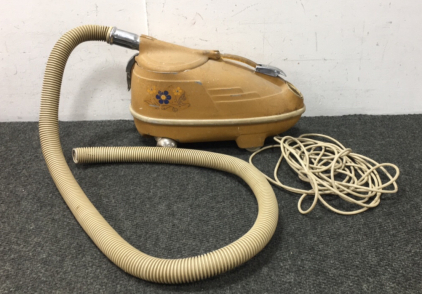 Vintage Brown Canister Vacuum