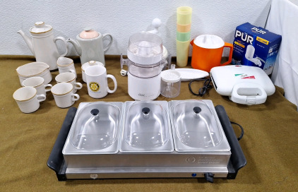 (1) Sensio Buffet Server, (1) Oster Cutrus Juicer & More
