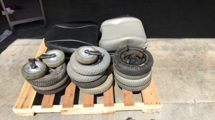 Pallet of Wheelchair Wheels and Seats