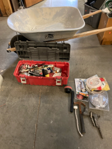 Unbranded wheelbarrow and Toolbox of Assorted Building Supplies