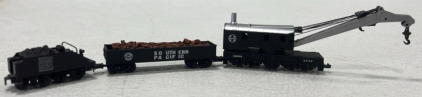 (1) N-Scale Bachmann Santa Fe 199774 Crane, (1) N-Scale Southern Pacific Lumber Traincar, (1) N-Scale Western Pacific Coal Traincar