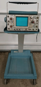 (1) Tektronix Oscilloscope With Cart Powers On