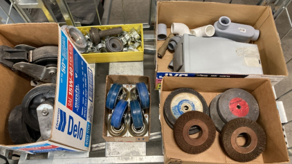 (2) Set of 4 Caster Wheels, Box of Assorted Grinder Wheels, Bin of Metal Clamps, Outdoor Load Center and more