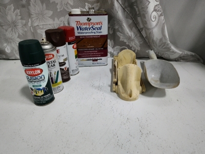 (1) Gallon of Thompsons Wood Stain & Sealer Semi Transparent. (4) Cans of Spray Paint Red Green Brown and Clear Acrylic(1) Aluminum Can Crusher and Ice Scoop