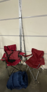 Camping! (2) Foldout Chairs, (3) Fishing Poles Without Reels, and Sleeping Bag