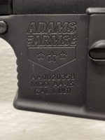 Adams Arms Model AA-15 .223 wild Caliber, Piston driven Semi Automatic Rifle W/ Spec Sheet, Scope Extra Magazine, Strap, And Zip Up Rifle Bag - 11