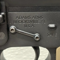 Adams Arms Model AA-15 .223 wild Caliber, Piston driven Semi Automatic Rifle W/ Spec Sheet, Scope Extra Magazine, Strap, And Zip Up Rifle Bag - 12