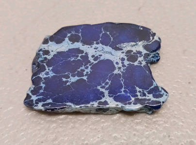 72.25ct. Dark Blue Sea Sediment Jasper Freeform Slice Gemstone