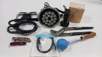 (1) LED Heat Lamp (1) Camp Buck Knife (1) Swiss Army Multi-Tool & More!
