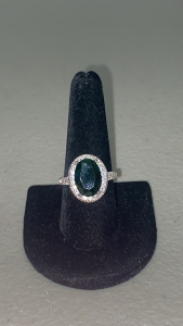 (1) Size 9 Faceted Oval Cur Emerald .925 Ring