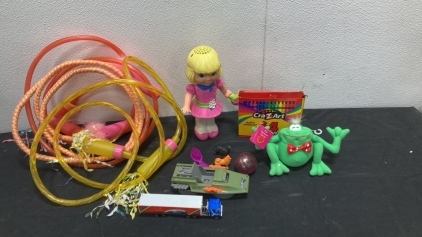 Two Jump Ropes with Crayons and Various other Childrens Toys.