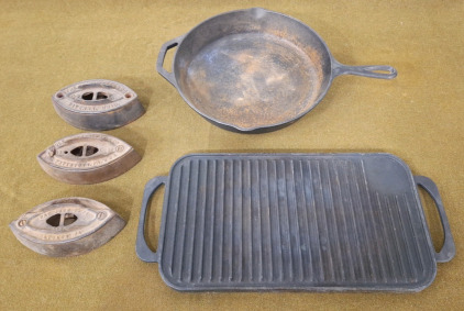 (1) Lodge Cast Iron Skillet, (1) Dual Sided Cast Iron Griddle & (3) Cast Iron, Sad Irons