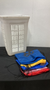 Laundry Basket With Six Drawstring Style Bags.