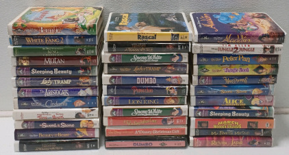 (34) Walt Disney VHS Movies Including Lady & The Tramp, Alice In Wonderland, & Dumbo
